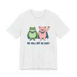 Heather cement t-shirt with cartoon frog and pig characters holding hands and text 'WE WILL NOT BE QUIET' on a white background by empowHER by Heidi | protest wear