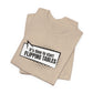 Folded tan t-shirt with cartoon speech bubble with text "It's Time to Start Flipping Tables" by empowHER by Heidi