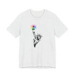 White t-shirt with the Statue of Liberty and rainbow Pride colors emitting from her torch by empowHER by Heidi