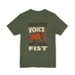 Green t-shirt with motivational message 'Raise your voice not your fist' – empowHER by Heidi political protest apparel