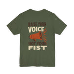 Green t-shirt with motivational message 'Raise your voice not your fist' – empowHER by Heidi political protest apparel