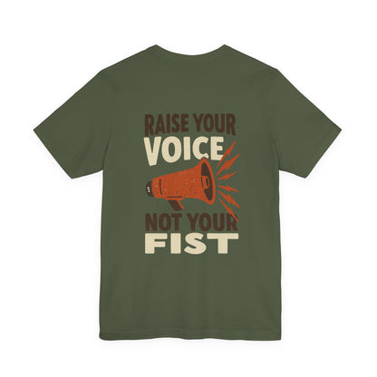 Green t-shirt with motivational message 'Raise your voice not your fist' – empowHER by Heidi political protest apparel