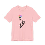 Pink t-shirt with the Statue of Liberty and rainbow Pride colors emitting from her torch by empowHER by Heidi