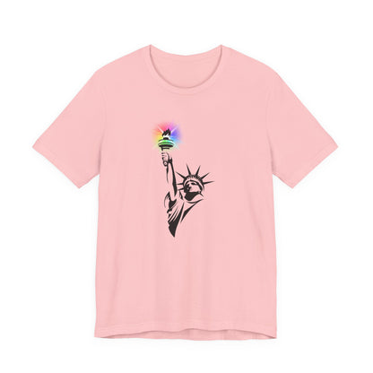 Pink t-shirt with the Statue of Liberty and rainbow Pride colors emitting from her torch by empowHER by Heidi