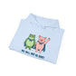 Light blue hoodie with cartoon frog and pig characters holding hands and text 'WE WILL NOT BE QUIET' on a white background by empowHER by Heidi | protest wear