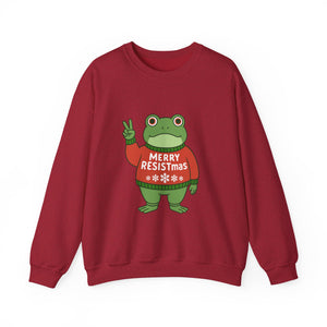 Red sweatshirt with the Portland protest frog wearing a sweater displaying 'Merry Resistmas' by empowHERbyHeidi