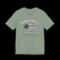 Sage t-shirt with American flag graphic and text that says "Immigrants are what make America Great" on a black background