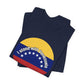 Folded navy blue t-shirt with a circular design featuring the Venezuelan flag and 'I stand with Venezuela' text by empowHER by Heidi