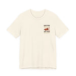 Beige t-shirt with a graphic and text "raise your voice, not your fist" – empowHER by Heidi political protest apparel