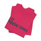 Folded pink t-shirt with text "It's Time to Start Flipping Tables" by empowHERbyHeidi