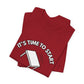 Folded red t-shirt with a flipping table graphic and text "It's time to start" by empowHER by Heidi