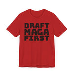 Red t-shirt with 'DRAFT MAGA FIRST' text on a plain background