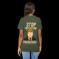 Person wearing a green t-shirt with a trump graphic and text on the back that says "Stop Protecting Predators"