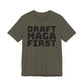 Army green t-shirt with 'DRAFT MAGA FIRST' text on a plain background