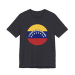 Dark gray t-shirt with a circular design featuring the Venezuelan flag and 'I stand with Venezuela' text by empowHER by Heidi