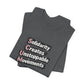 Folded gray t-shirt with motivational quote "solidarity creates unstoppable movements" by empowHER by Heidi
