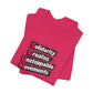 Folded pink t-shirt with motivational quote "solidarity creates unstoppable movements" by empowHER by Heidi