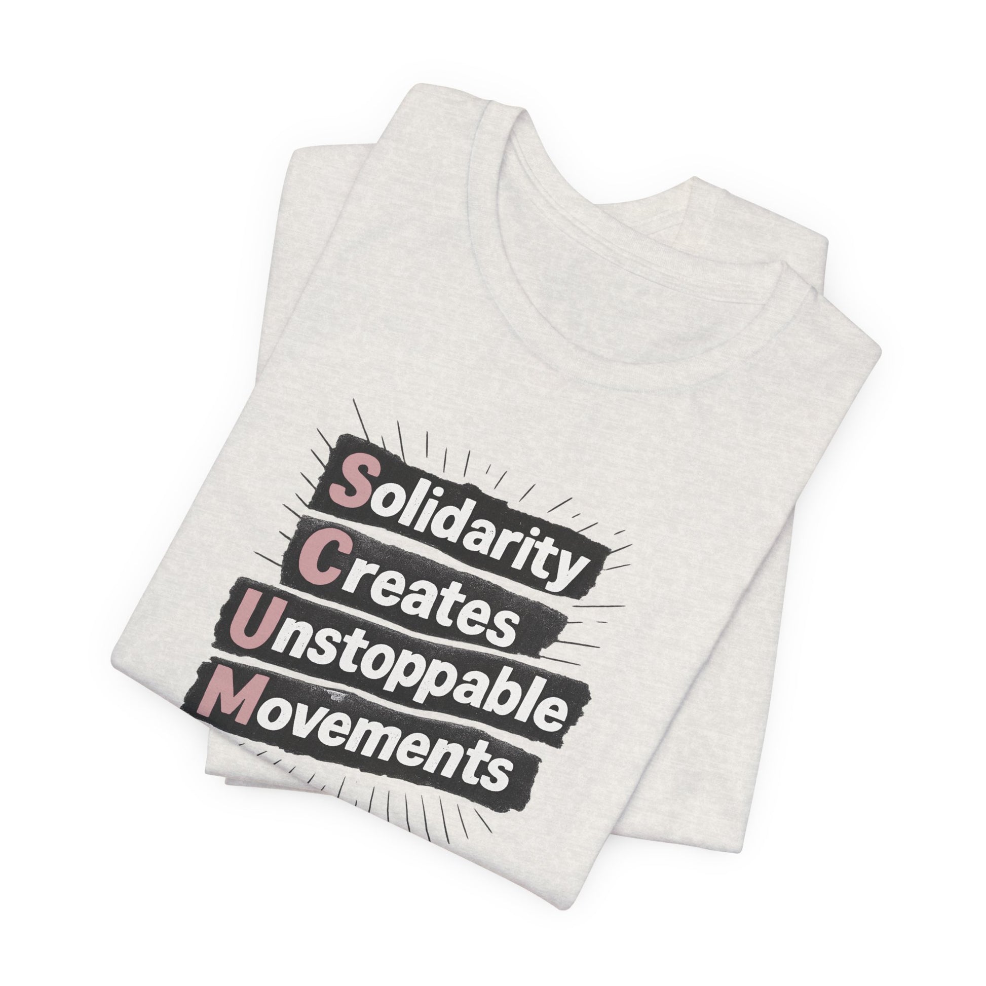 Folded heather cement t-shirt with motivational quote "solidarity creates unstoppable movements" by empowHER by Heidi