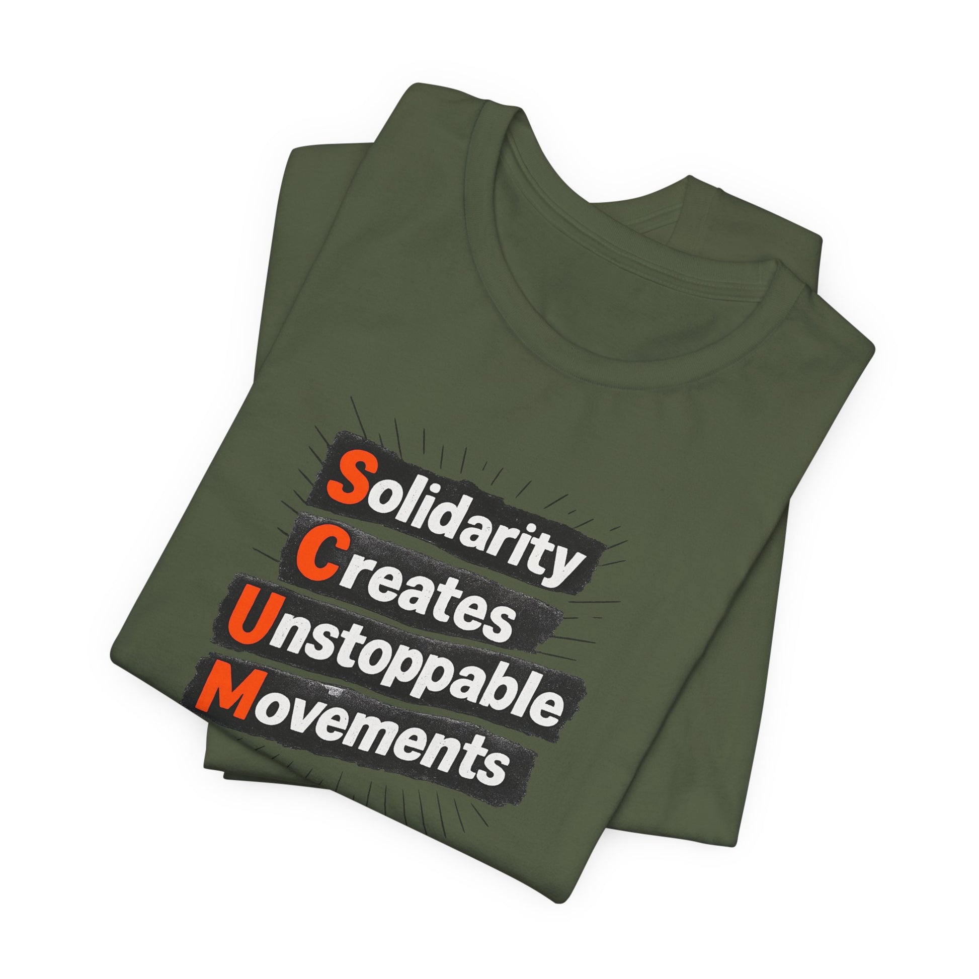 Folded dark green t-shirt with motivational quote "solidarity creates unstoppable movements" by empowHER by Heidi