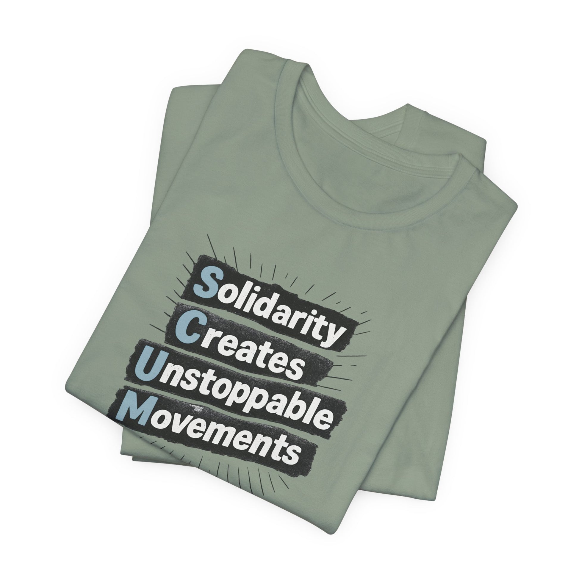 Folded sage green t-shirt with motivational quote "solidarity creates unstoppable movements" by empowHER by Heidi