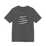 Gray t-shirt with motivational quote "solidarity creates unstoppable movements" by empowHER by Heidi