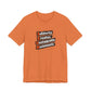 Oranget-shirt with motivational quote "solidarity creates unstoppable movements" by empowHER by Heidi