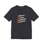 Dark gray t-shirt with motivational quote "solidarity creates unstoppable movements" by empowHER by Heidi