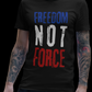 Person wearing a black t-shirt with 'Freedom Not Force' text in an urban setting